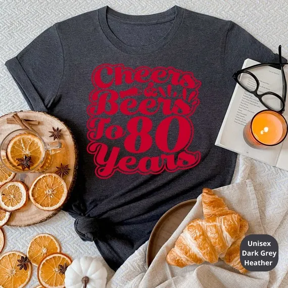 Cheers & Beers to 80 Years! Celebrate a Lifetime of Memories with Our Customizable 80th Birthday Shirt