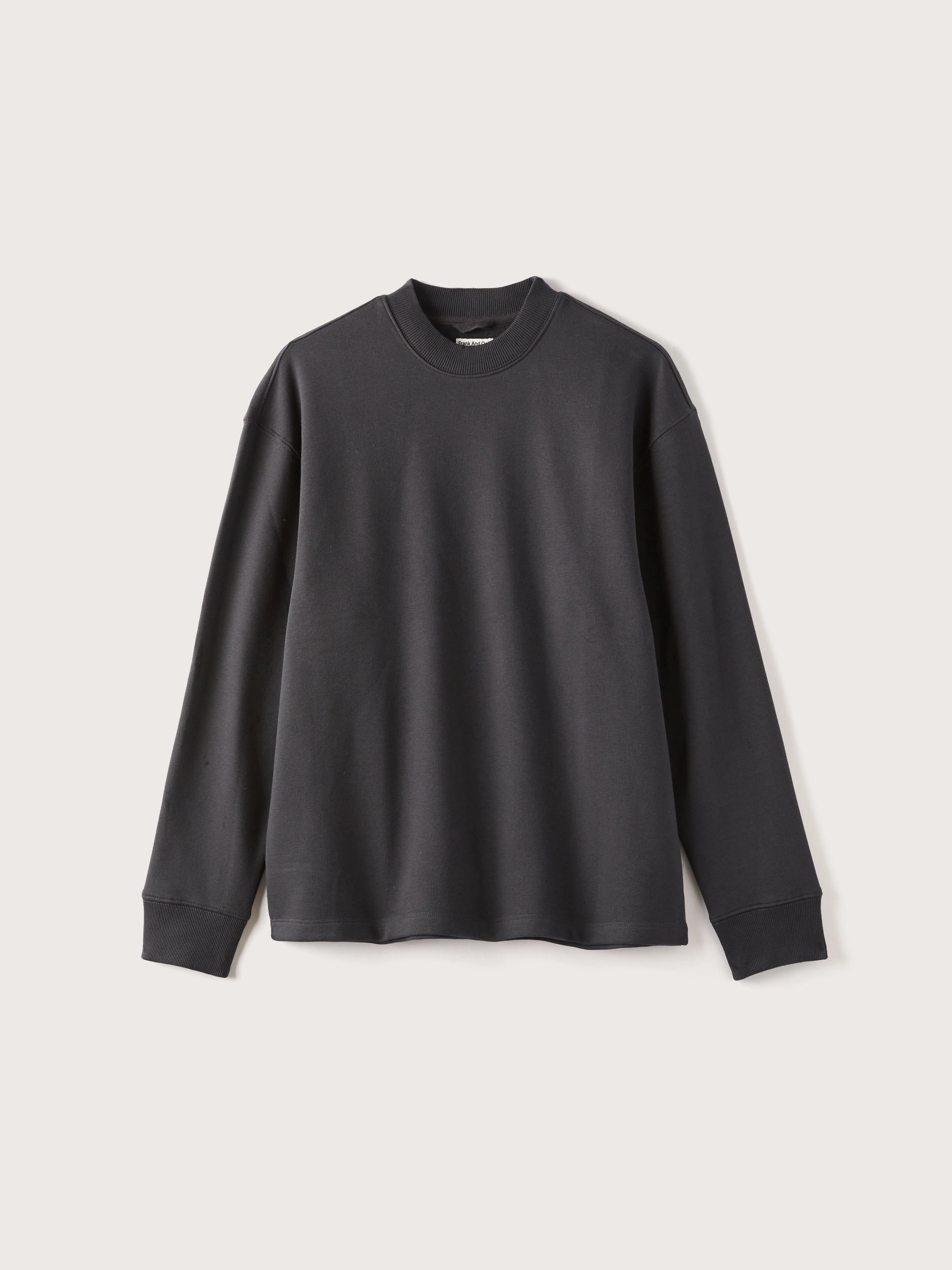The French Fleece Mockneck in Washed Black